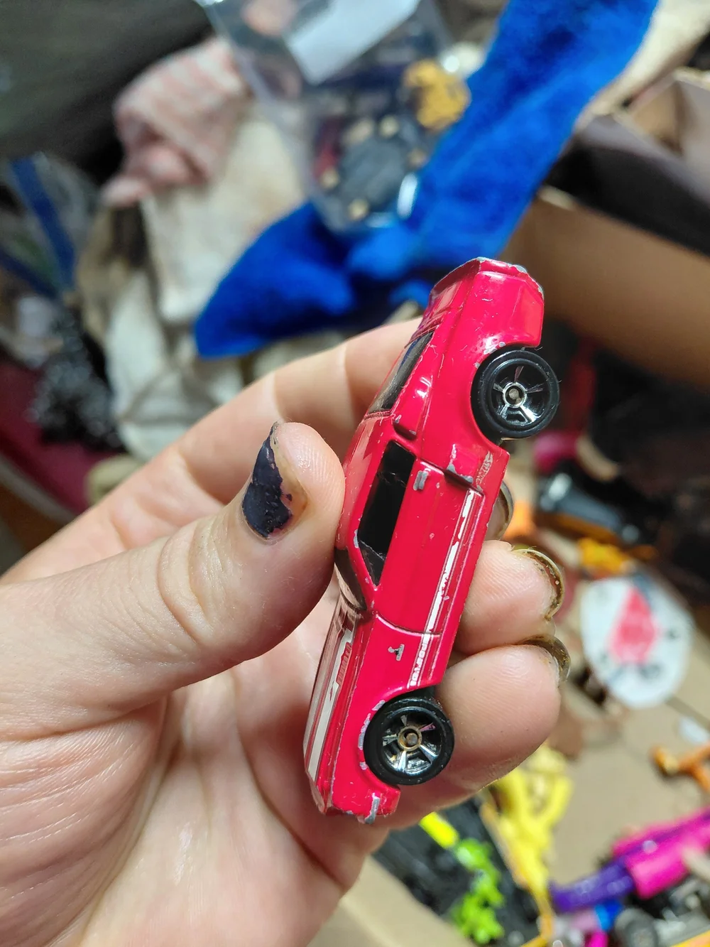 red 1968 Shelby GT500 diecast car by Hot Wheels